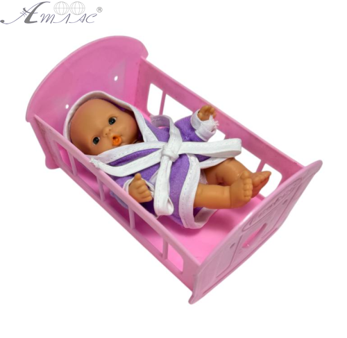 Іграшка Пупс гумовий 10см у ліжечку 04787 Іграшка Пупс гумовий 10см у ліжечку 04787